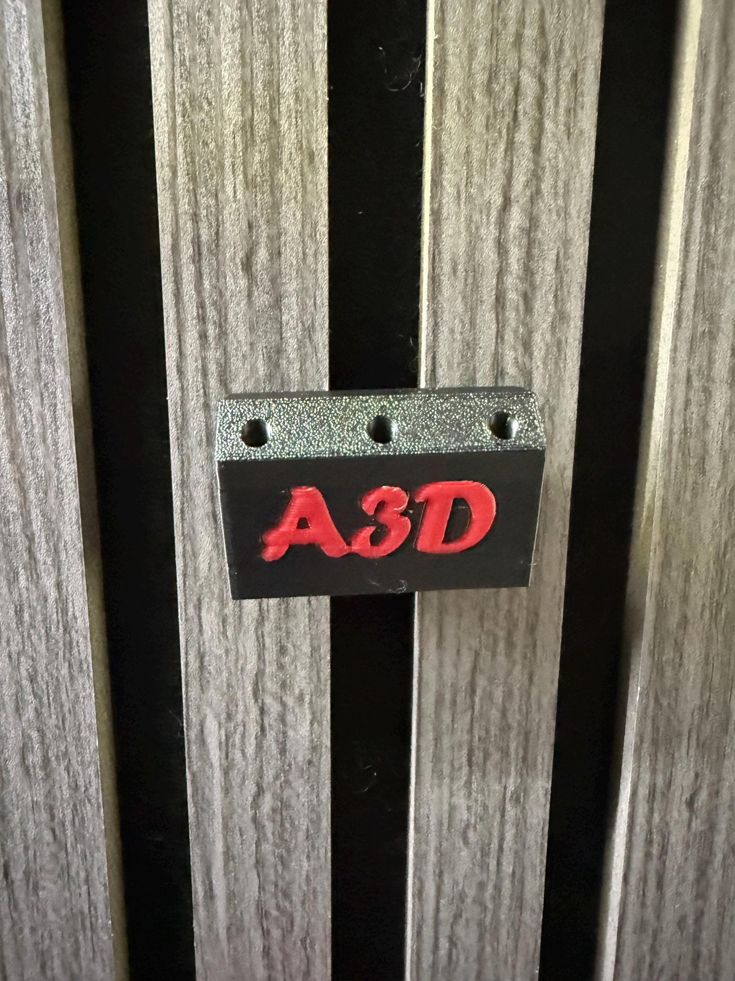Personalised dart hold that is designed for Acoustic wood panels.
