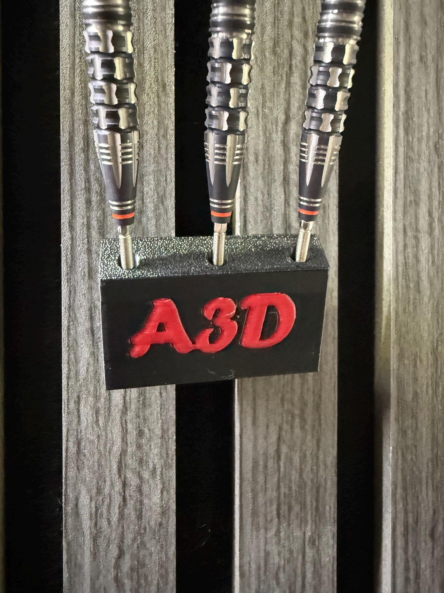 Personalised dart hold that is designed for Acoustic wood panels.