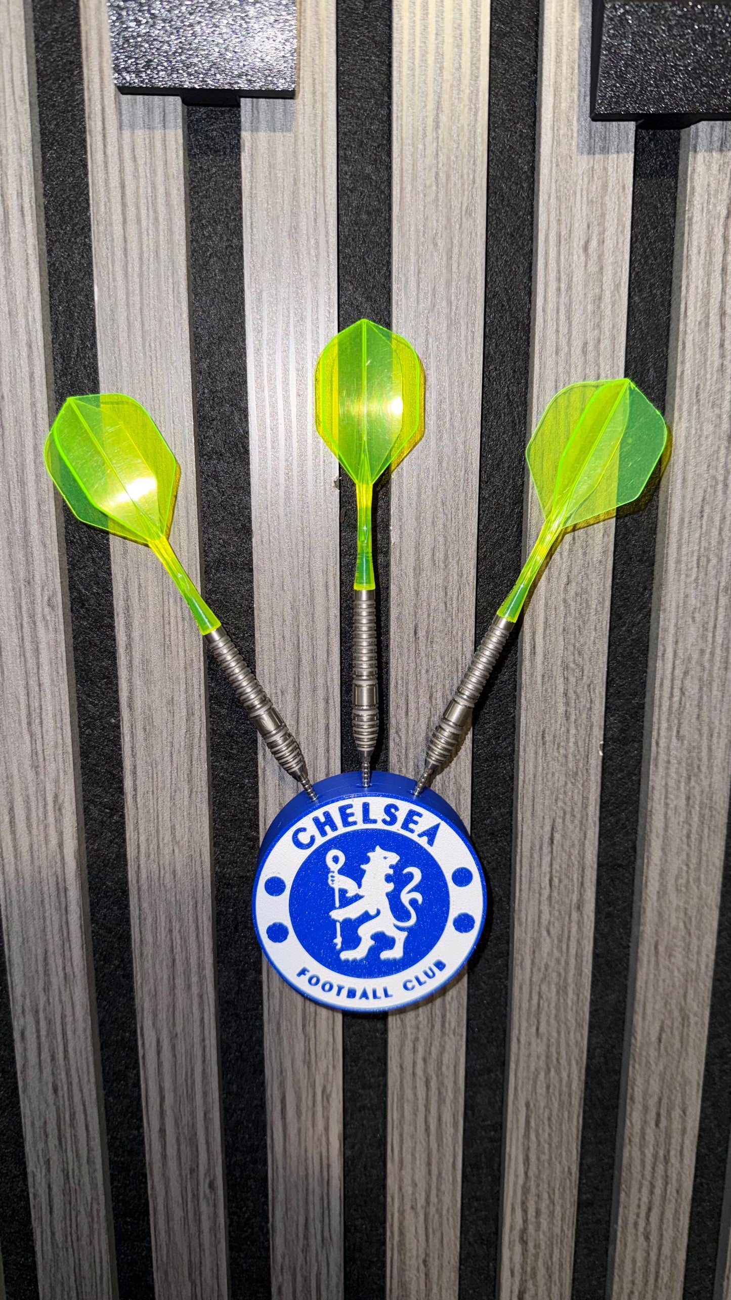 Themed dart holder that is designed for Acoustic wood panels.